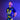 Man wearing a sports jersey with 'Hamilton Tarmac' branding against a purple background